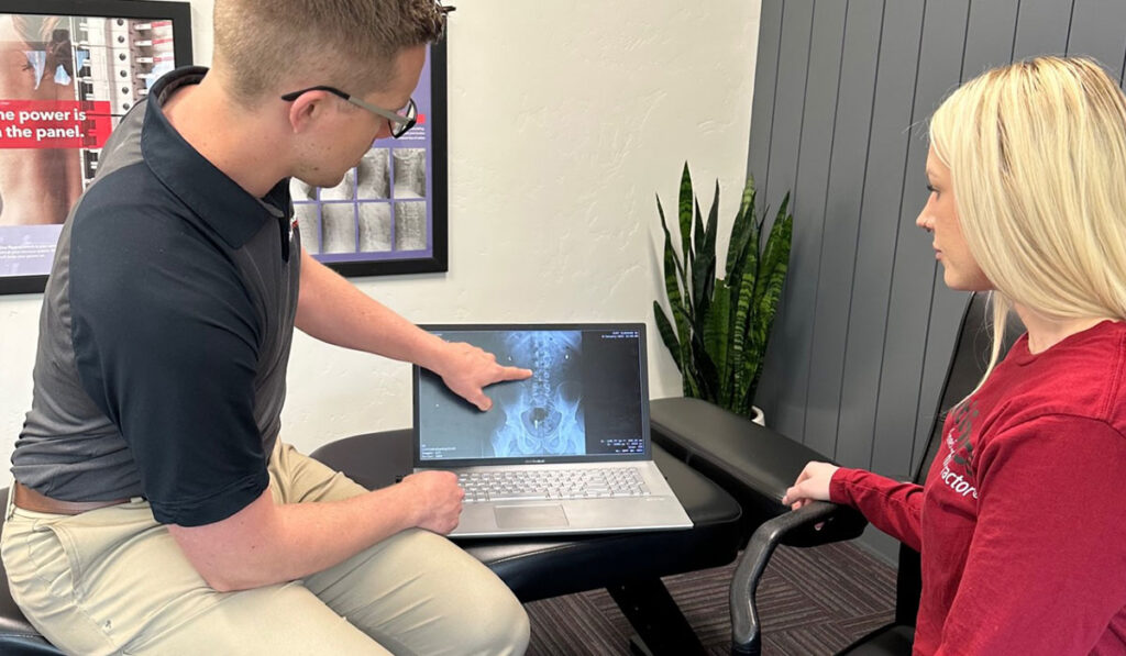 Dr. Kurt Slonaker reviewing X-Rays with a patient at HealthSource of Meridian